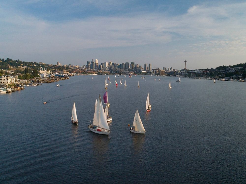 Aerial view of sailboats racing on Lake Union in the evening with the Seattle skyline art print by Greg Probst for $57.95 CAD