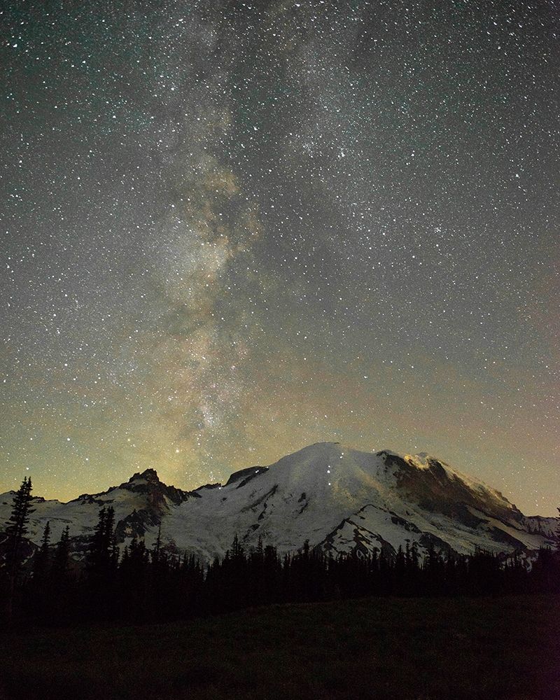 The lights of climbers can be seen on the mountain as the Milky Way rises behind Mt Rainier art print by Greg Probst for $57.95 CAD