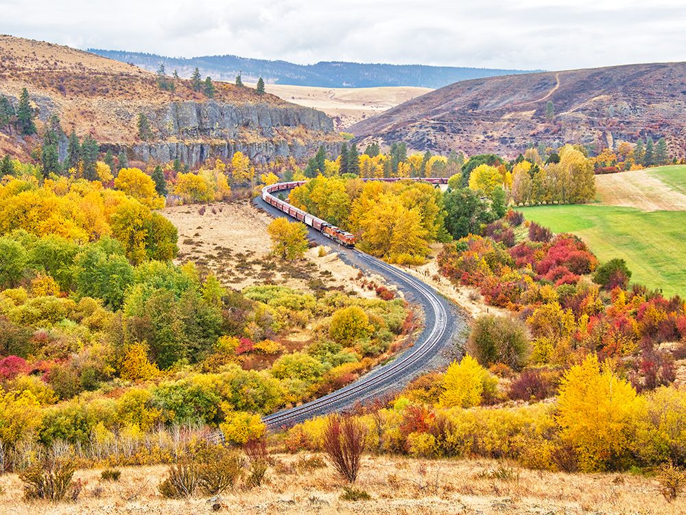 USA-Washington State-Kittitas County. Burlington Northern Santa Fe train along the Yakima River. art print by Julie Eggers for $57.95 CAD