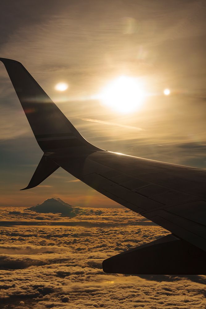 Mount Rainier view from a jetliner, Washington State, USA. art print by Rob Casey for $57.95 CAD