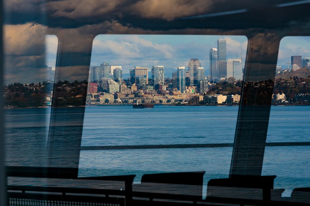 Ferry window views of the Seattle waterfront, Washington State, USA. art print by Rob Casey for $57.95 CAD