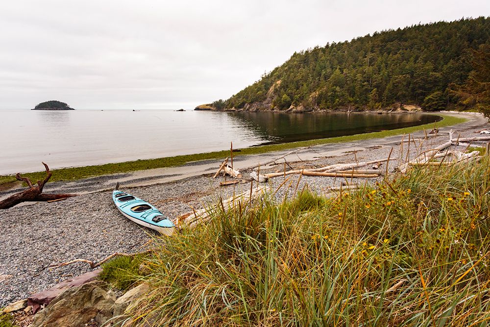 Sea kayak on the shore of Bowman Bay, Deception Pass State Park, Washington State, USA. art print by Rob Casey for $57.95 CAD