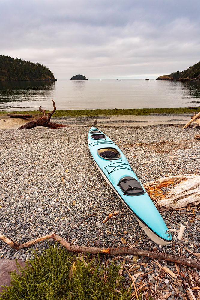 Sea kayak on the shore of Bowman Bay, Deception Pass State Park, Washington State, USA. art print by Rob Casey for $57.95 CAD