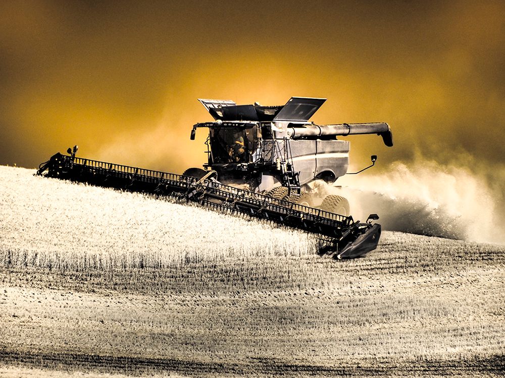 USA, Washington State, Palouse. Infrared combine harvesting on hillside art print by Terry Eggers for $57.95 CAD