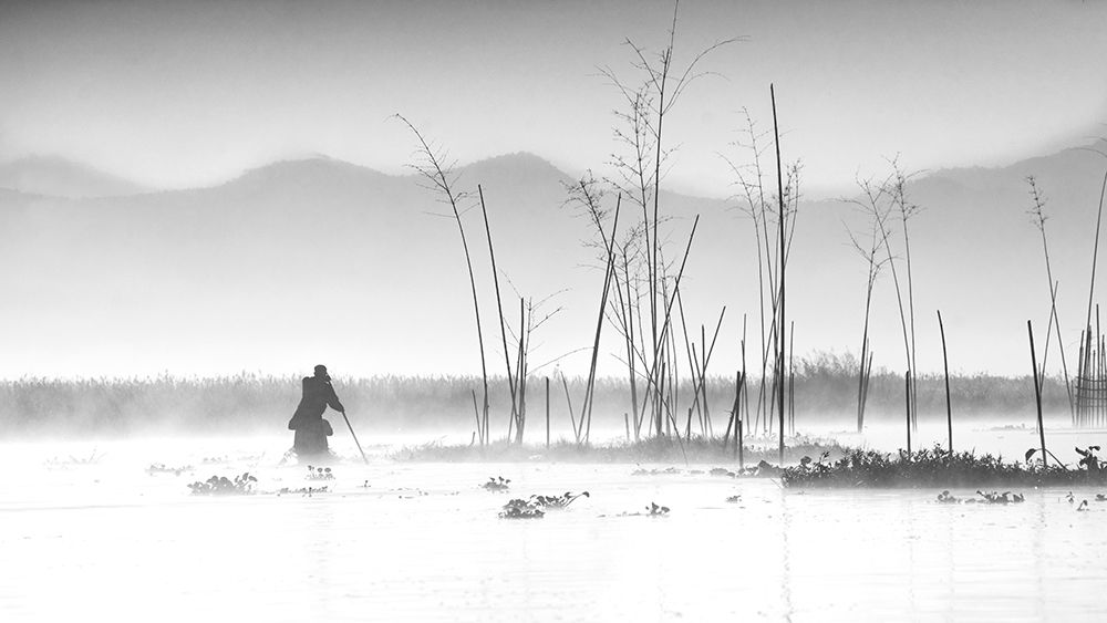 Fishing in a misty morning art print by Joe B N for $57.95 CAD