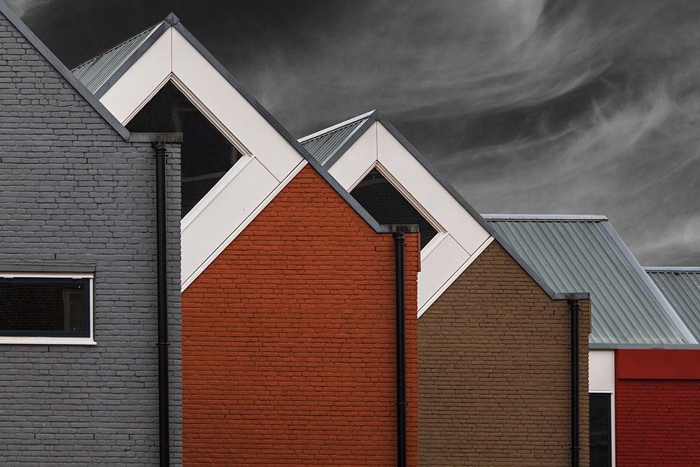 Coloured houses art print by Theo Luycx for $57.95 CAD