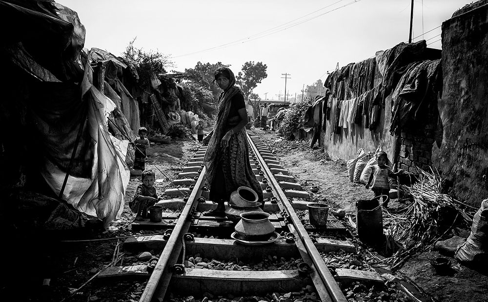 A scene of life on the train tracks - Bangladesh art print by Joxe Inazio Kuesta for $57.95 CAD