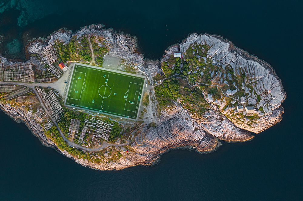 Football Field On The Edge Of The World art print by Simoon for $57.95 CAD