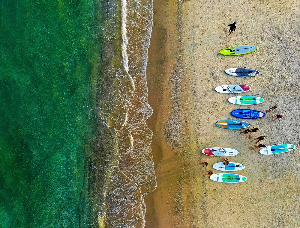 Early morning beach activities. art print by Arnon Orbach for $57.95 CAD