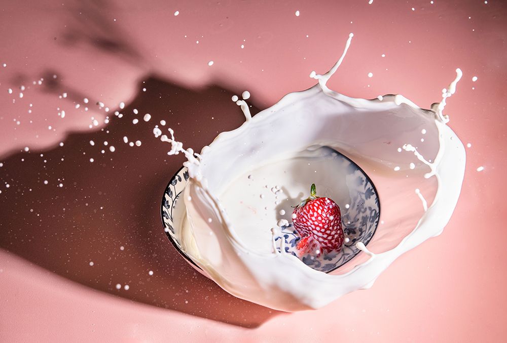 Strawberry fall into the milk trap art print by Grace Qian Guo for $57.95 CAD