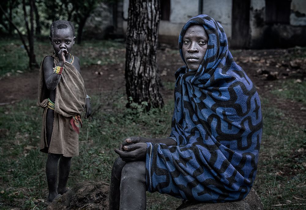 Surmi Tribe Man And Child - Ethiopia art print by Joxe Inazio Kuesta for $57.95 CAD