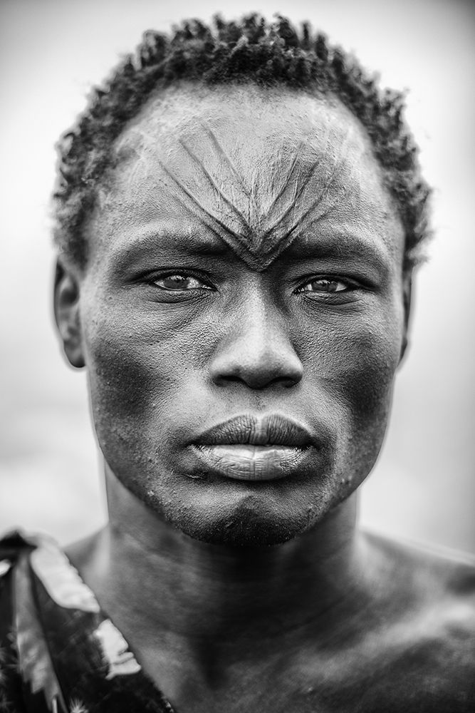 The Face Of The Mundari art print by Trevor Cole for $57.95 CAD
