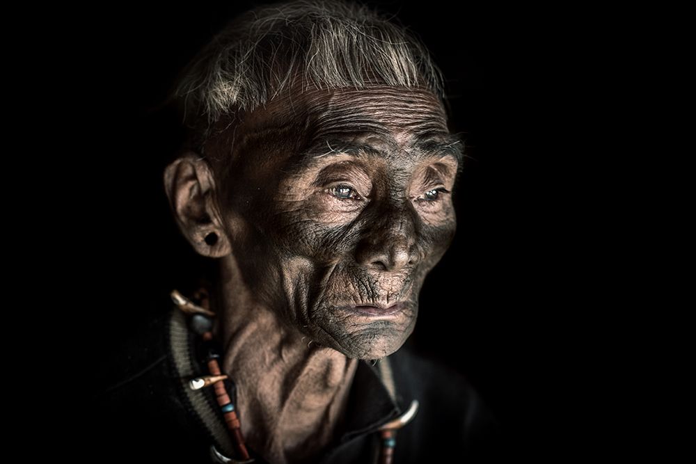The Tattooed Face Of A Konyak Man art print by Trevor Cole for $57.95 CAD