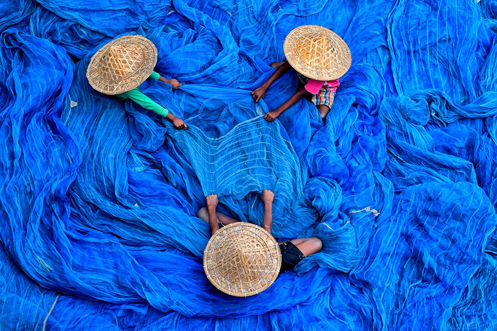 blue fishing art print by Avishek Das for $57.95 CAD