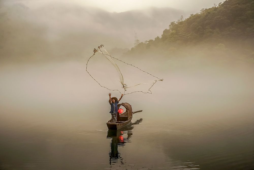 A Fisherman in the Morning Mist art print by Raymond Ren Rong for $57.95 CAD