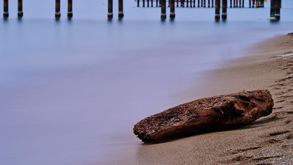 Old Pier On The Beach And Long Exposure Sea Waves art print by Engin Akyurt for $57.95 CAD