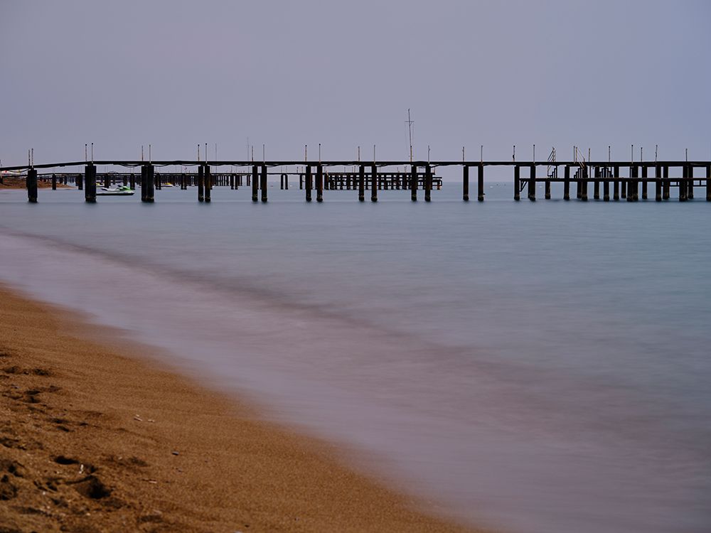 Old Pier On The Beach And Long Exposure Sea Waves art print by Engin Akyurt for $57.95 CAD