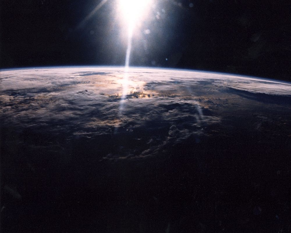 Sunlight over Earth as seen by Discovery crew art print by NASA for $57.95 CAD