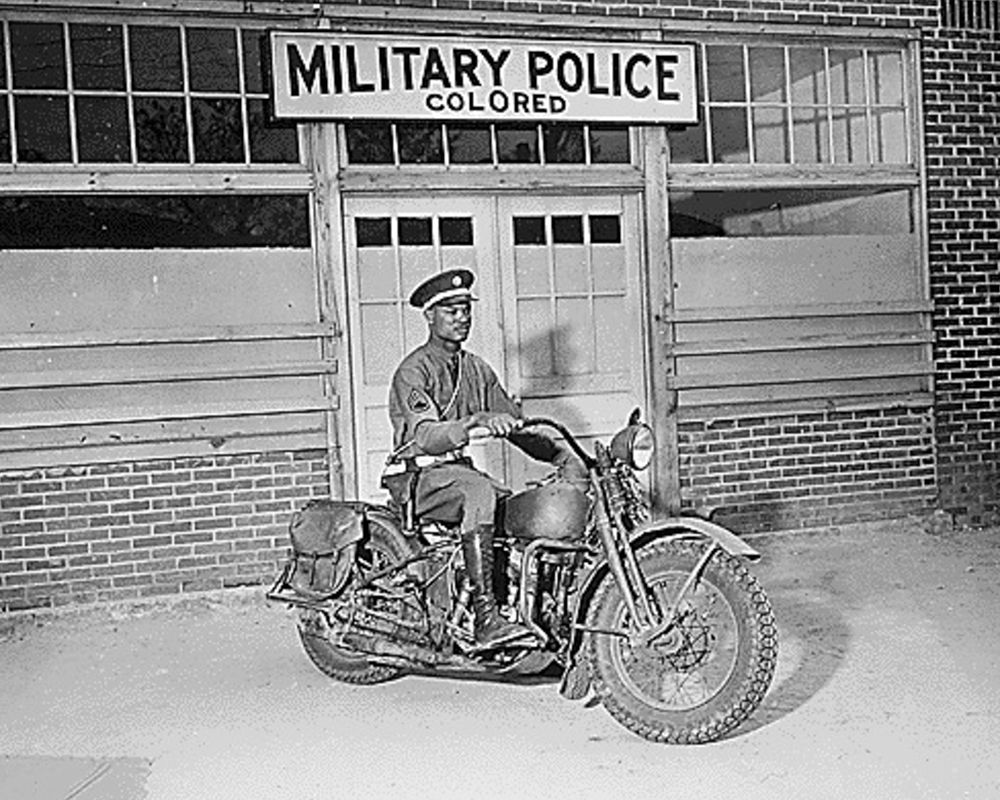 WWII An MP on motorcycle stands ready to answer all calls around his area. Columbus-Georgia art print by U.S. Archives for $57.95 CAD