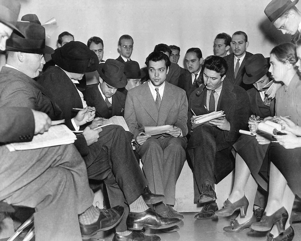 Orson Welles with reporters after the War of the Worlds radio broadcast, 1938 art print by Vintage Hollywood Archive for $57.95 CAD
