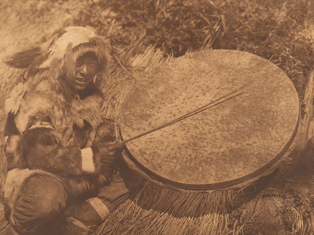 The Drummer - Nunivak 1928 art print by Edward S Curtis for $57.95 CAD