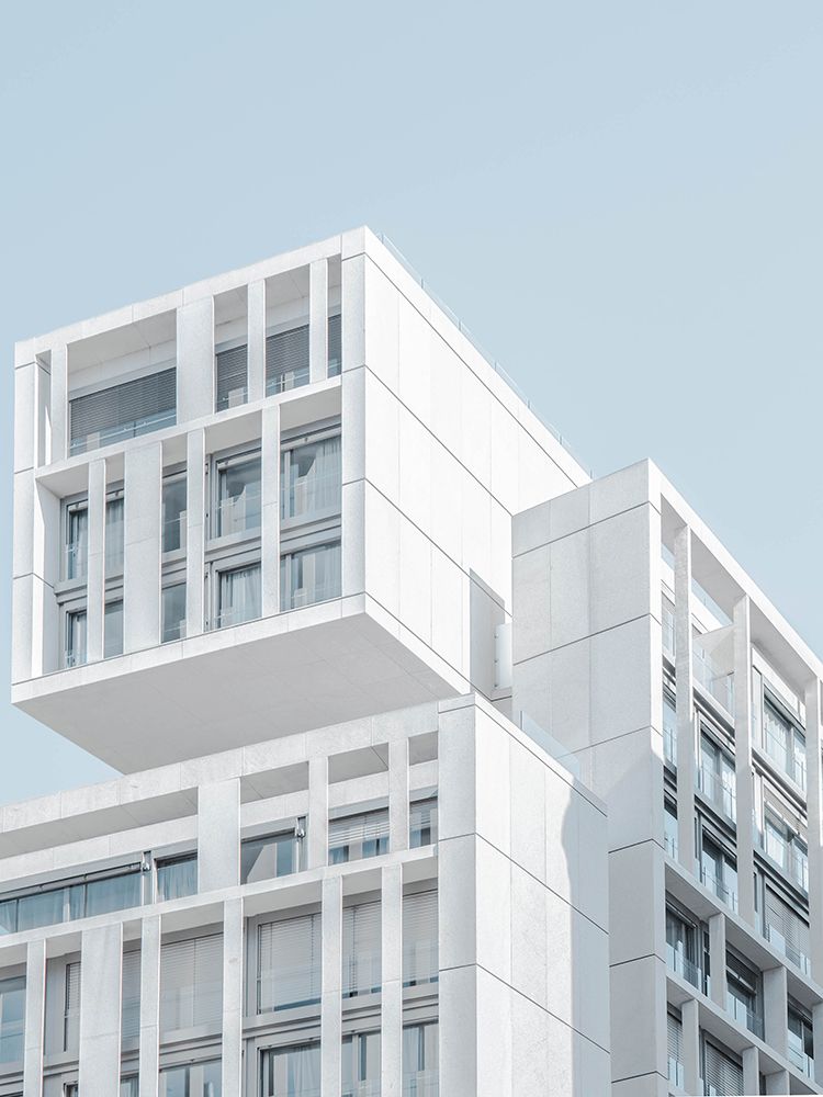 A white concrete apartment building in Madrid art print by Artographie for $57.95 CAD