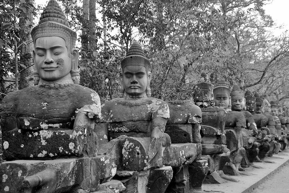 Buddha Statue Row in Black and White art print by Artographie for $57.95 CAD