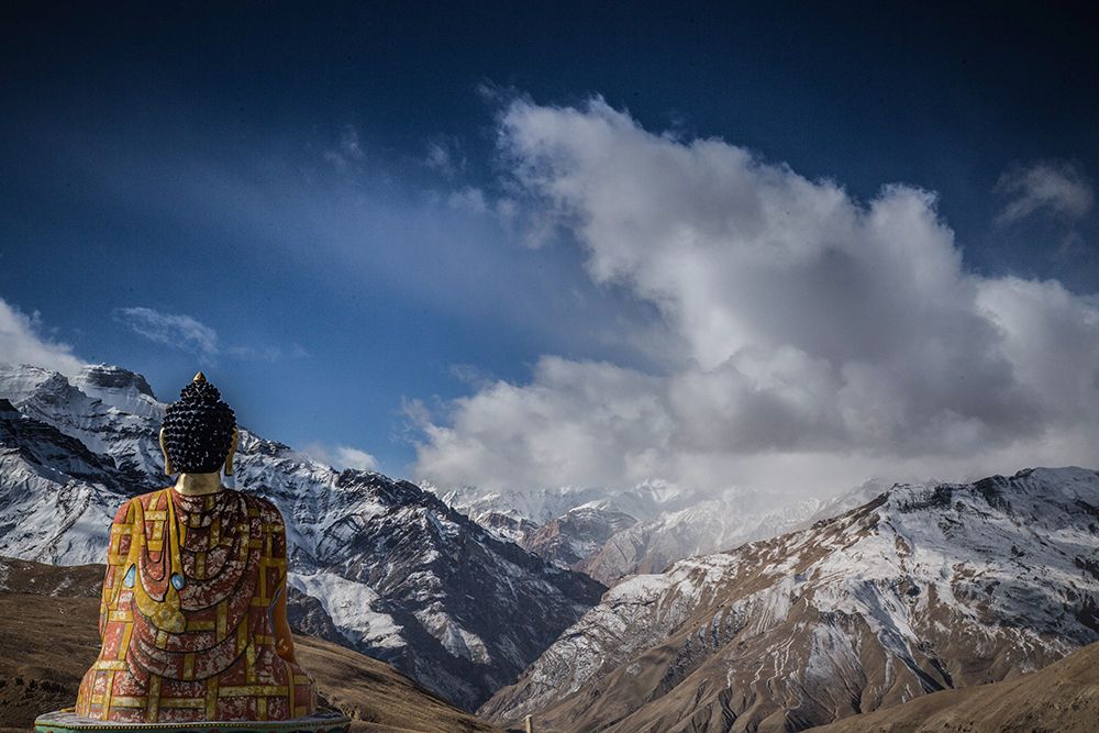 Sitting Buddha Overlooking Mountains art print by Artographie for $57.95 CAD