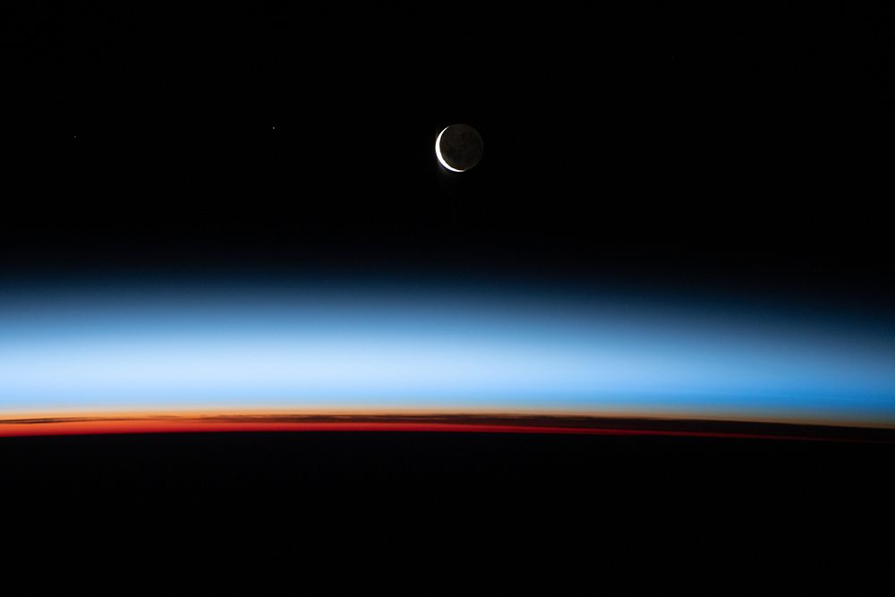 A Waxing Crescent Moon Pictured from the ISS art print by NASA for $57.95 CAD
