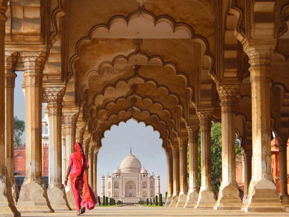 Woman in traditional Sari walking towards Taj Mahal art print by Pangea Images for $57.95 CAD