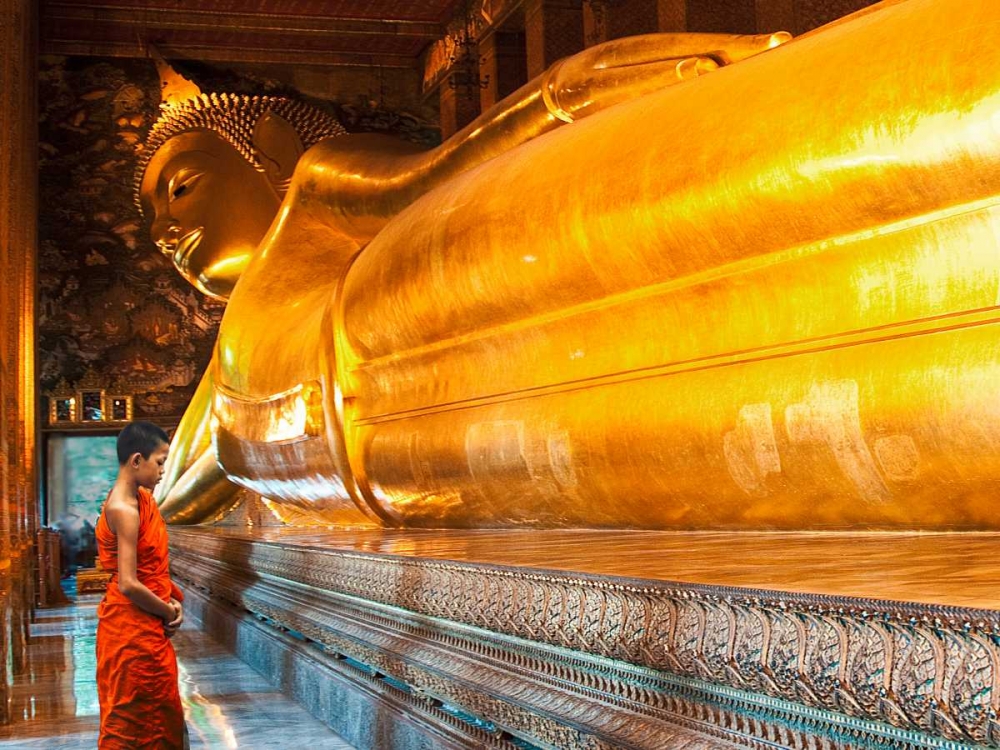 Praying the reclined Buddha, Wat Pho, Bangkok, Thailand art print by Pangea Images for $57.95 CAD