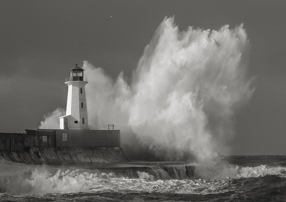 Lighthouse in raging Sea (BAndW) art print by Pangea Images for $57.95 CAD