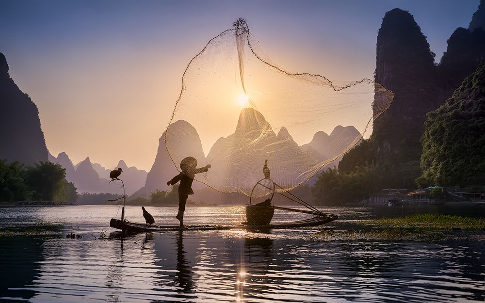 Fishing The Sun art print by Jesus M. Garcia for $57.95 CAD