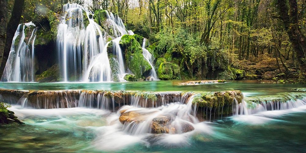 Waterfall in a forest art print by Pangea Images for $57.95 CAD