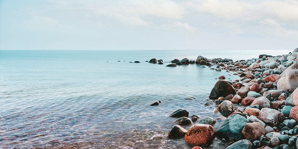 Pebbles on the Beach art print by Pangea Images for $57.95 CAD