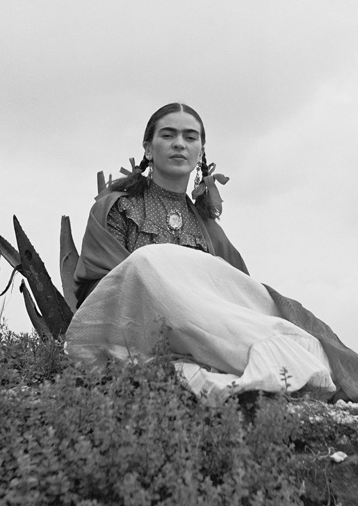 Frida Kahlo seated in the desert art print by Toni Frissell for $57.95 CAD