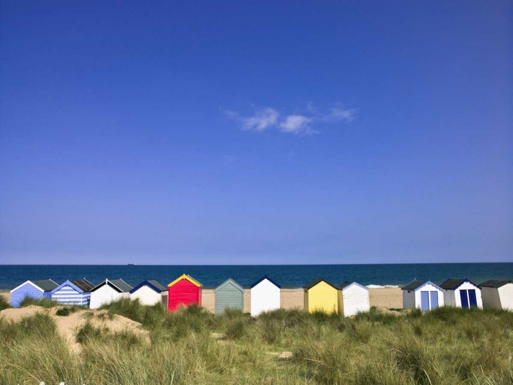 Wodden Fence at beach with huts in the Background art print by Assaf Frank for $57.95 CAD