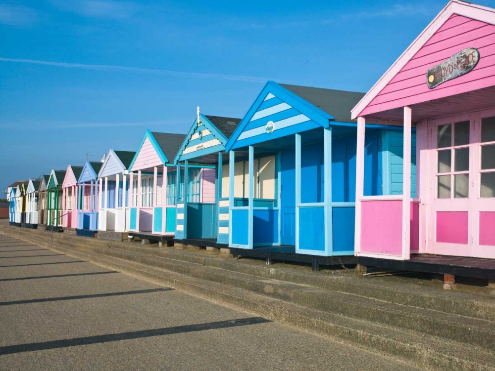 Beach hut in a row against blue sky art print by Assaf Frank for $57.95 CAD