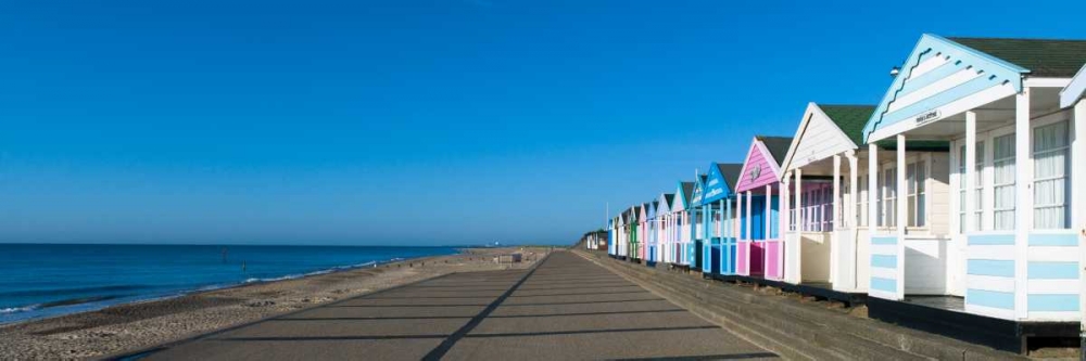 Beach huts in a row against blue skies art print by Assaf Frank for $57.95 CAD