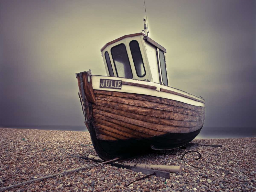 Boat moored on pebbled Beach art print by Assaf Frank for $57.95 CAD