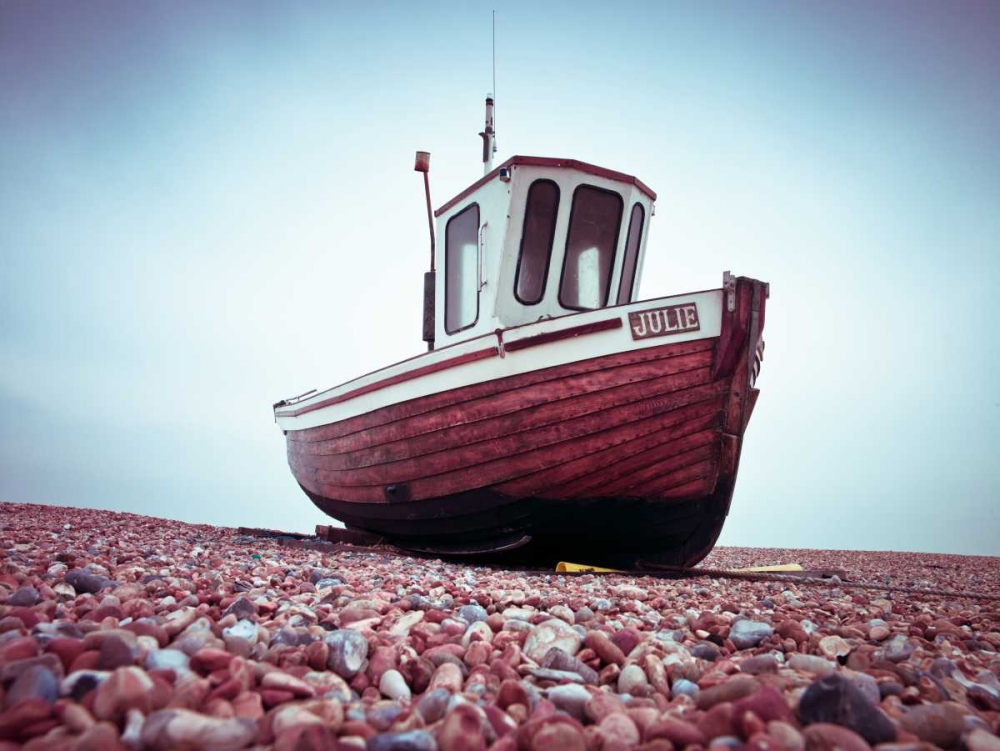 Boat moored on pebbled Beach art print by Assaf Frank for $57.95 CAD