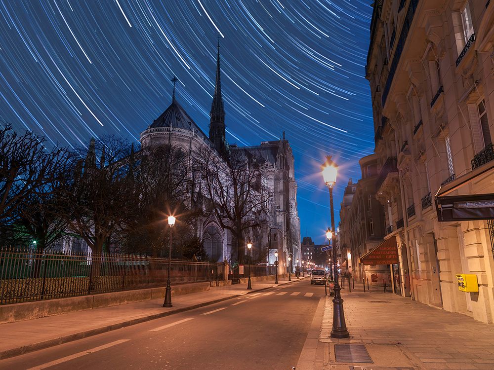 Star Trails above Notre-Dame de Paris art print by Assaf Frank for $57.95 CAD