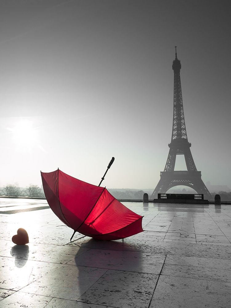 Two umbrellas next to the Eiffel tower art print by Assaf Frank for $57.95 CAD