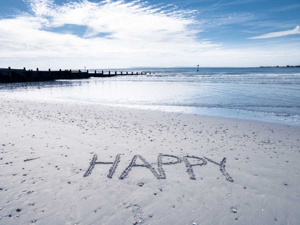 HAPPY message written in smooth sand at the beach art print by Assaf Frank for $57.95 CAD