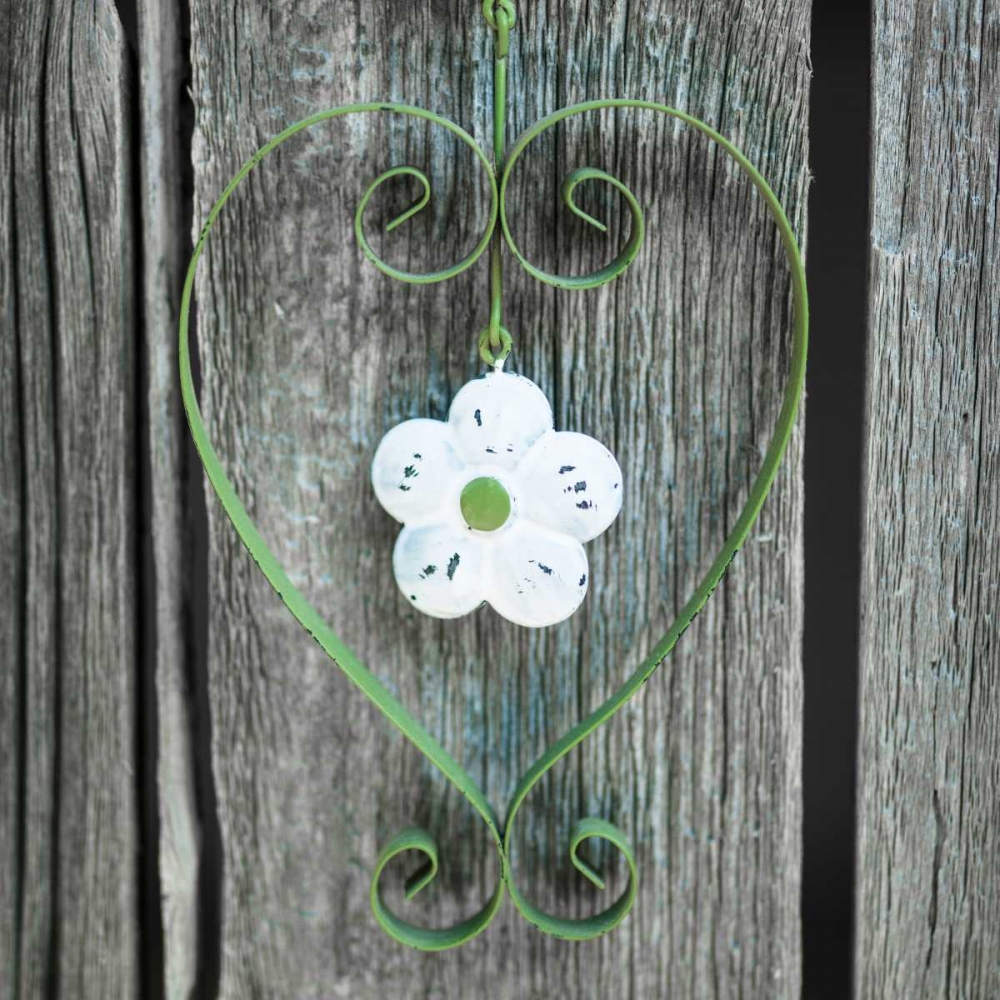Heart shape with flower on wooden background art print by Assaf Frank for $57.95 CAD