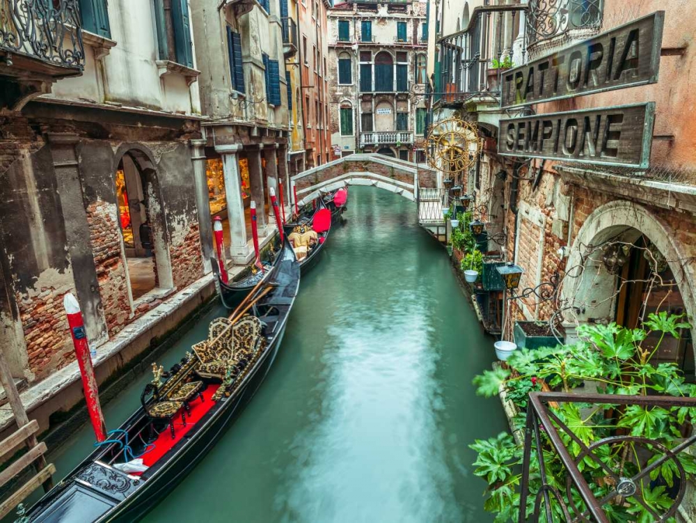 Gondola in narrow canal through old buildings, Venice, Italy art print by Assaf Frank for $57.95 CAD