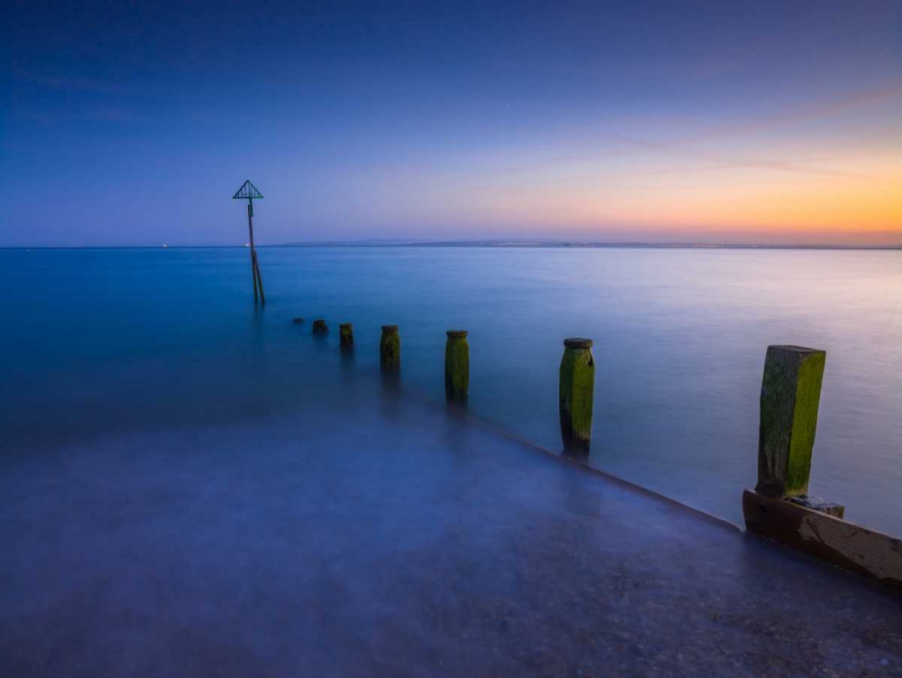 Groynes at dusk, Hayling Island, UK art print by Assaf Frank for $57.95 CAD