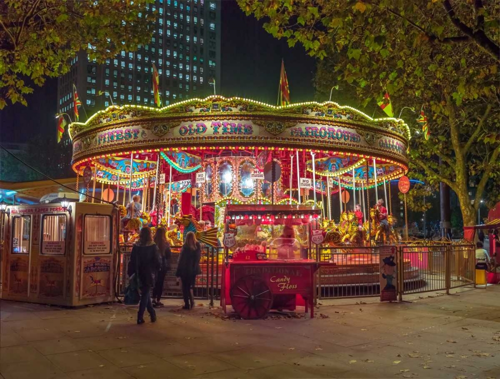 Spinning carousel at night in garden, London, UK art print by Assaf Frank for $57.95 CAD