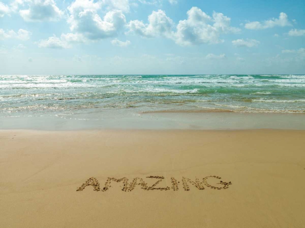 Word Amazing written in sand on the beach art print by Assaf Frank for $57.95 CAD