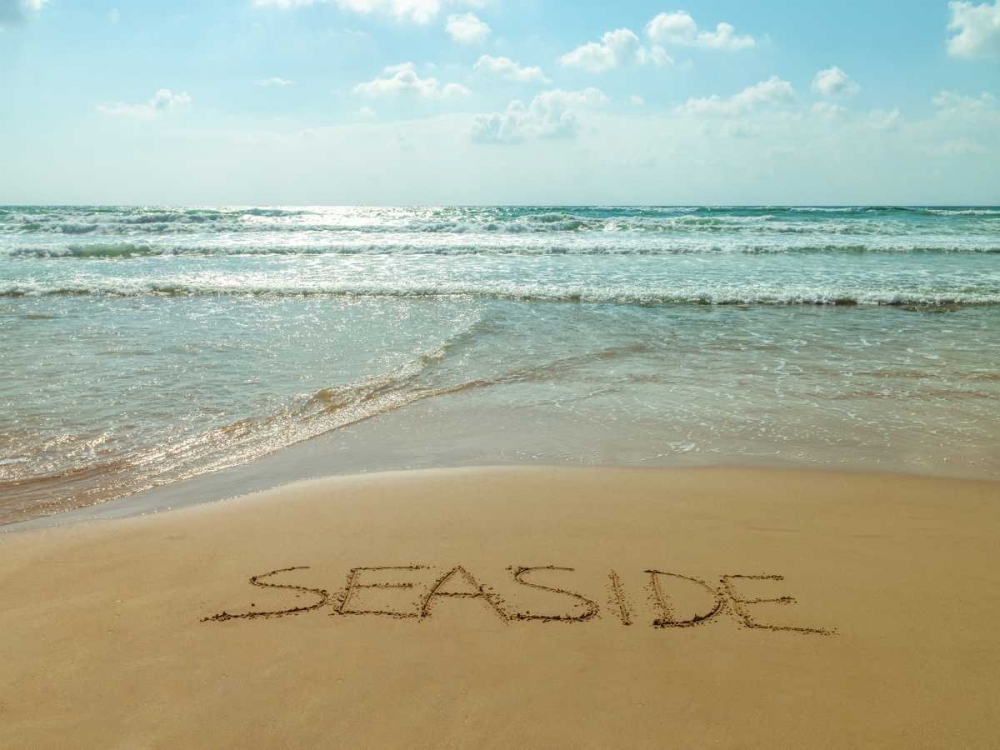 Word Seaside written in sand on the beach art print by Assaf Frank for $57.95 CAD
